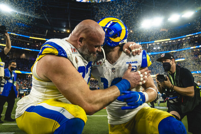 Andrew Whitworth and Cooper Kupp celebrate after winning the Super Bowl.