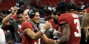 Bryce Young and Will Anderson celebrate